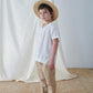 My Little Cozmo - Hernank linnen polo shirt sand en wit